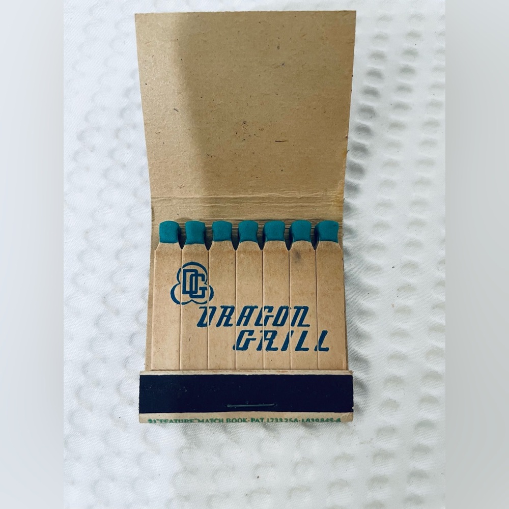 Matchbook Dragon Grill feature 21 strike full unstruck matchbox